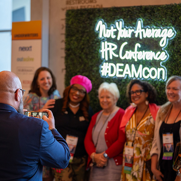 DEAMcon25-networking-square Group of women posing for a photo