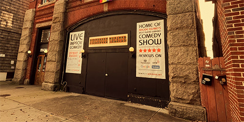 Exterior of Firehouse Theatre in Newport featuring live comedy and entertainment venue signage.