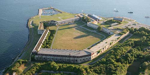 Aerial view of Fort Adams State Park overlooking Newport Harbor and the surrounding coastline.