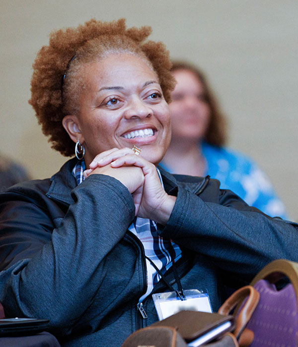 DEAMcon Audience member smiling