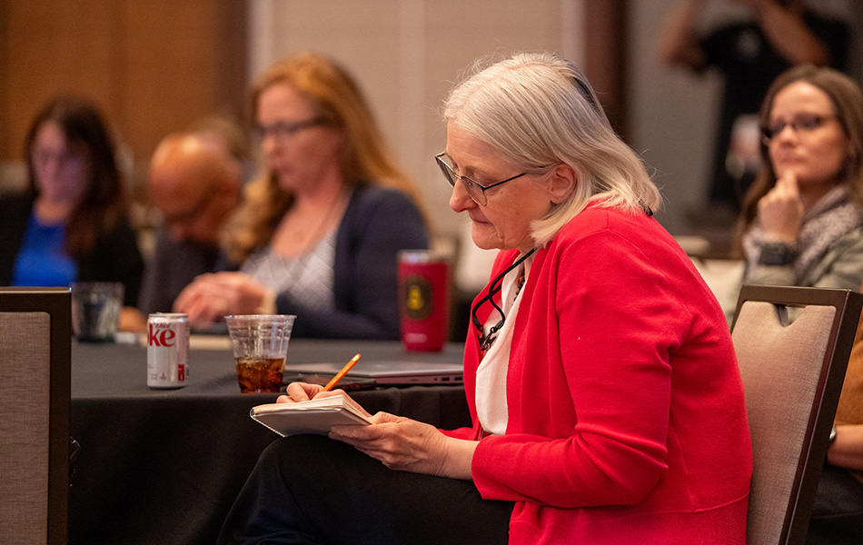 Women taking notes