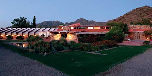 The exterior of Frank Lloyd Wright's Taliesin West at dusk